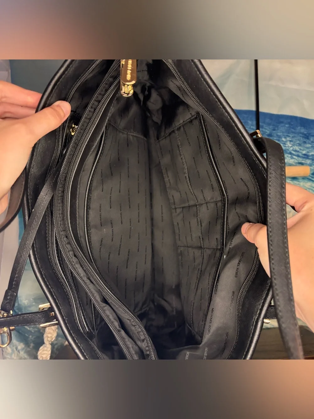 Michael Kors Black Leather Tote with Logo Charm and Gold Accents